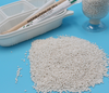 Materiale pla composto di granuli di colore personalizzato con particelle di plastica degradabili